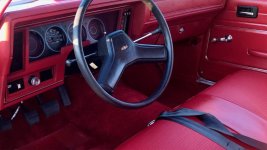 1978-Chevrolet-Nova-sedan-interior-001-Mecum-Auctions-Carmine-Metallic-seat-steering-wheel-das...jpg