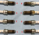 Spark plugs close up (labeled).webp