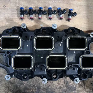 Old injectors out of upper intake